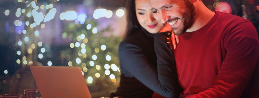 Couple signing up for 7 principles workshop